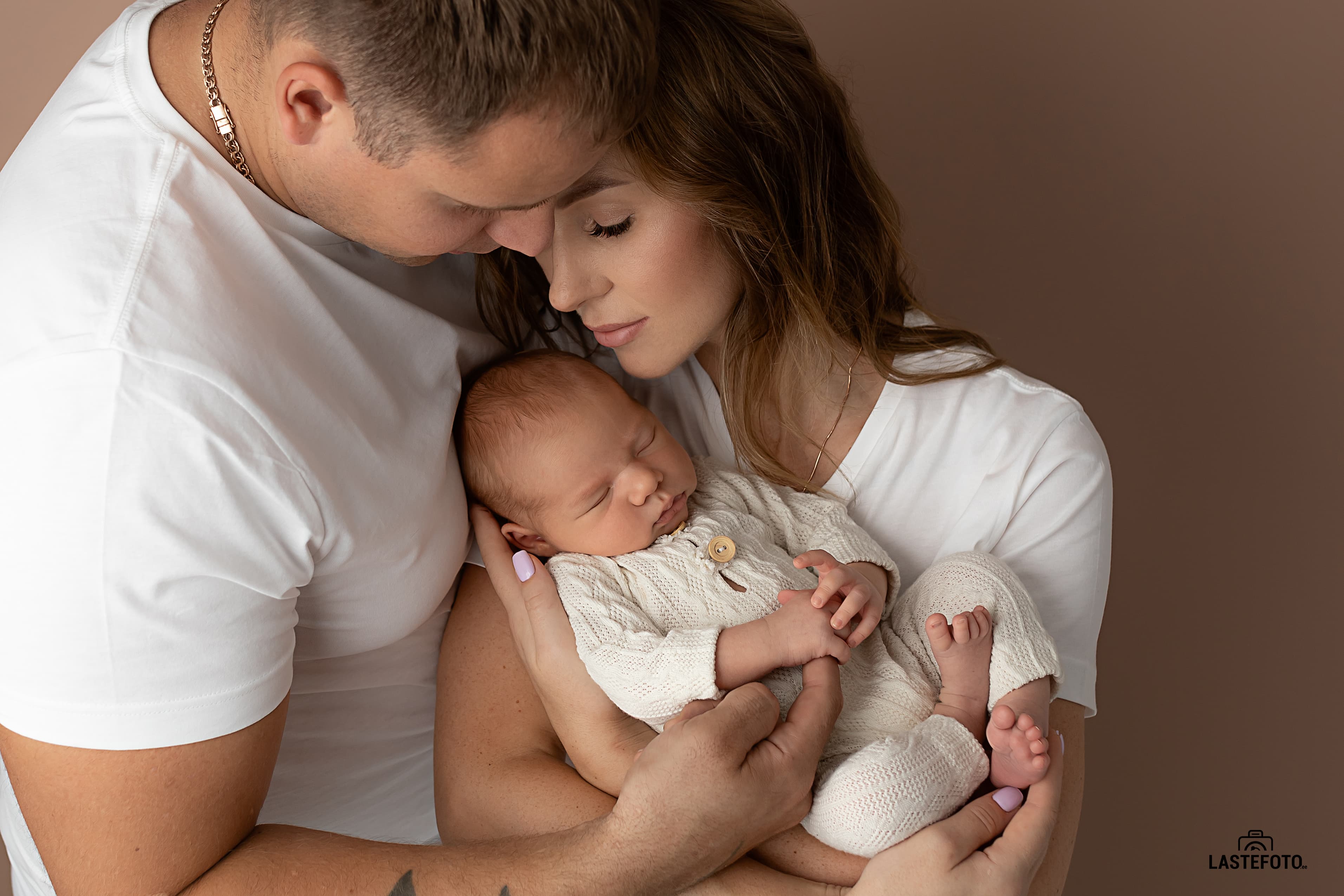 Family photo shoot with newborn in the studio in Tallinn